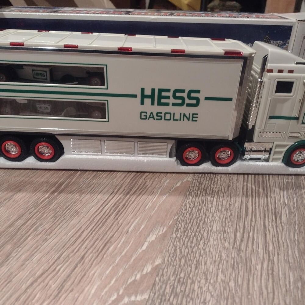 Vintage 2003 Hess toy truck with 2 race cars like new excellent condition